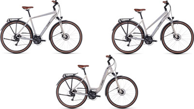 Tre Cube Touring Pro-cykler ved siden af hinanden: en med diamantstel, en med trapezstel og en med lavt stigehøjde.