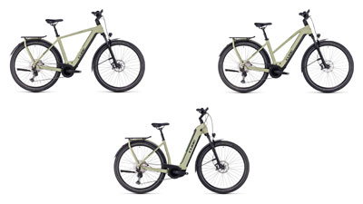 Her ses tre hvide Cube Kathmandu Hybrid-elcykler, henholdsvis med en diamantramme, en trapezramme og en lavstigeramme.